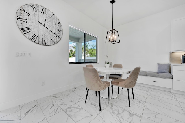 dining area with a chandelier