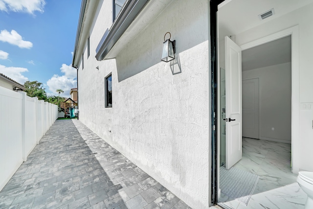 view of home's exterior featuring a patio area