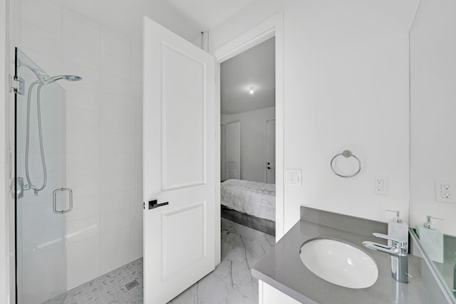 bathroom featuring walk in shower and vanity