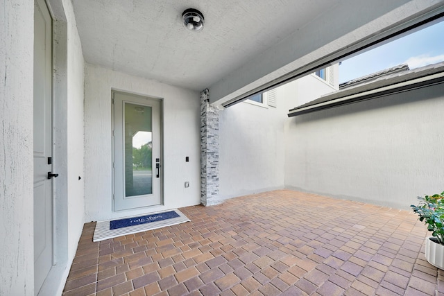 4478 SW 178th Ave Unit 4478, Miramar, FL 33029 - property entrance featuring a surveillance system and stucco siding