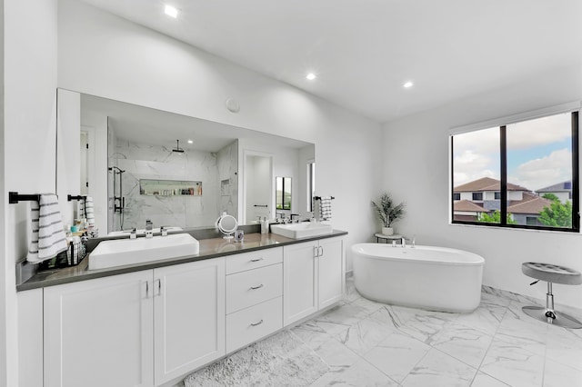 4478 SW 178th Ave Unit 4478, Miramar, FL 33029 - full bathroom featuring a marble finish shower, marble look tiles, double vanity, a freestanding tub, and recessed lighting