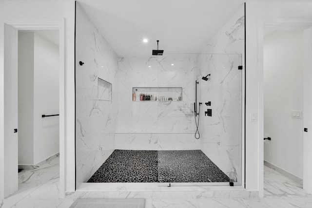 bathroom featuring tiled shower