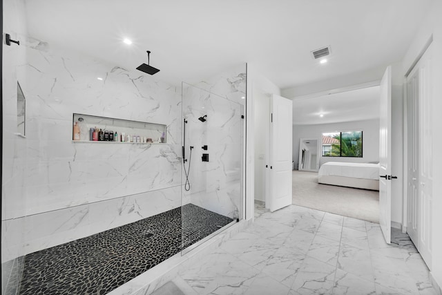 bathroom featuring tiled shower