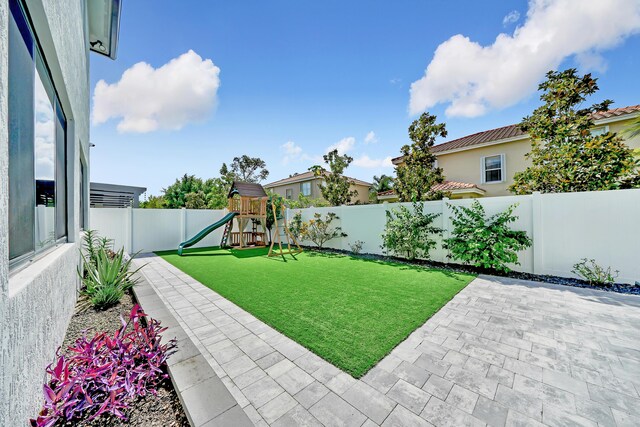 4478 SW 178th Ave Unit 4478, Miramar, FL 33029 - view of yard with a patio and a playground