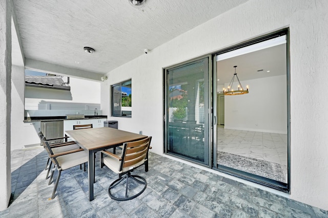 4478 SW 178th Ave Unit 4478, Miramar, FL 33029 - dining area with a chandelier and a textured ceiling