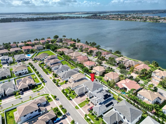 drone / aerial view featuring a water view