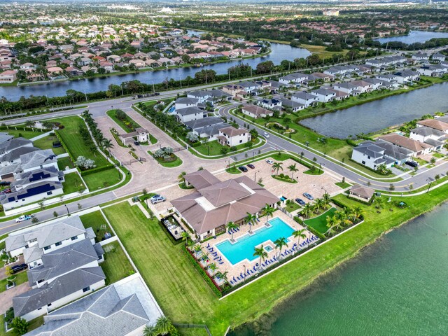 4478 SW 178th Ave Unit 4478, Miramar, FL 33029 - aerial view of property and surrounding area featuring nearby suburban area, a pool, and a nearby body of water