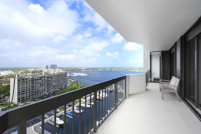 balcony featuring a water view