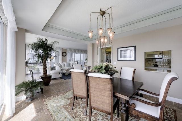 dining room featuring an inviting chandelier