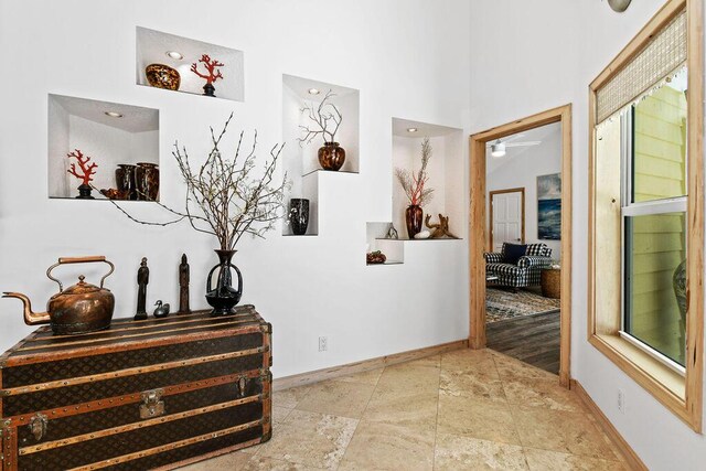 2388 Palm Harbor Dr, Palm Beach Gardens, FL 33410 - hall with baseboards and a high ceiling