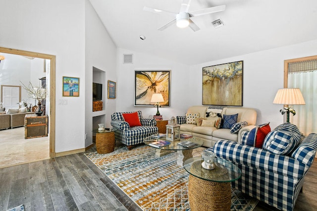 living room featuring lofted ceiling, wood-type flooring, and ceiling fan