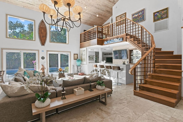 living room with a chandelier, french doors, high vaulted ceiling, and wooden ceiling