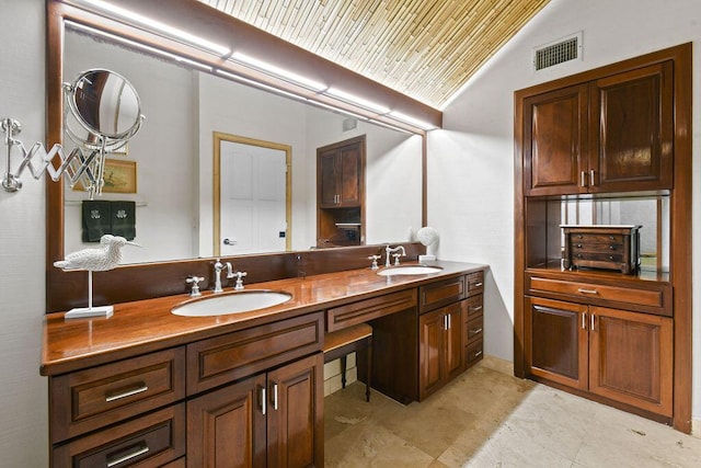 2388 Palm Harbor Dr, Palm Beach Gardens, FL 33410 - full bath with lofted ceiling, double vanity, and wood ceiling
