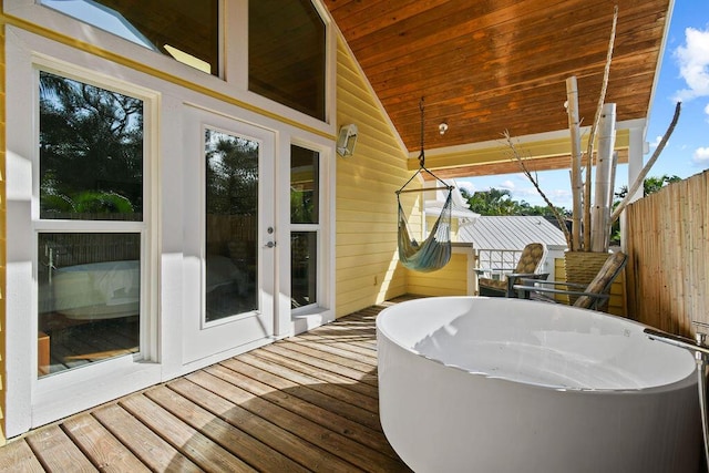 2388 Palm Harbor Dr, Palm Beach Gardens, FL 33410 - wooden terrace featuring fence and french doors