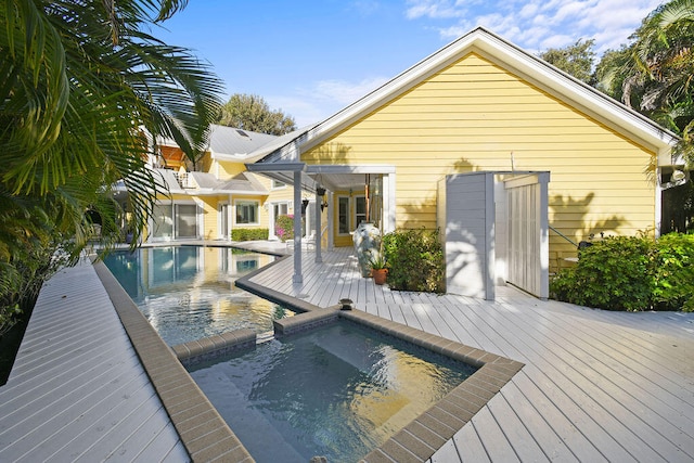 view of pool featuring a wooden deck