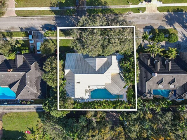 2388 Palm Harbor Dr, Palm Beach Gardens, FL 33410 - aerial view of property and surrounding area featuring a pool area and property parcel outlined