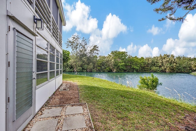 view of yard with a water view