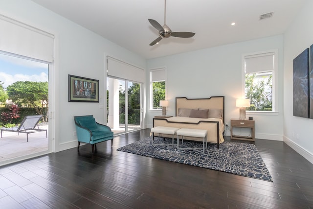 bedroom featuring dark wood-type flooring, ceiling fan, and access to outside