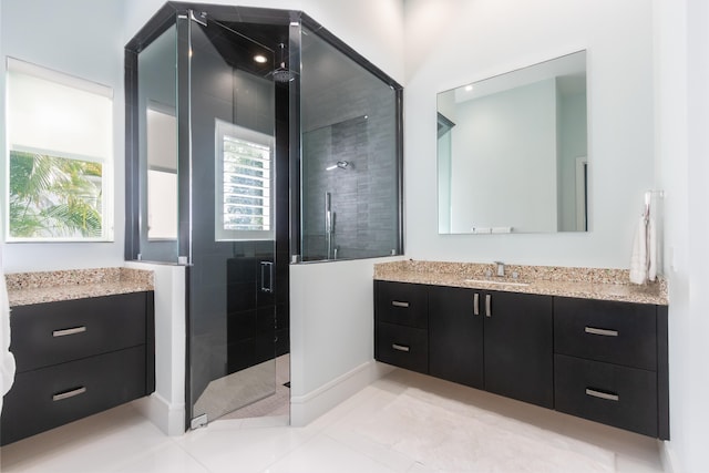 bathroom with vanity and an enclosed shower