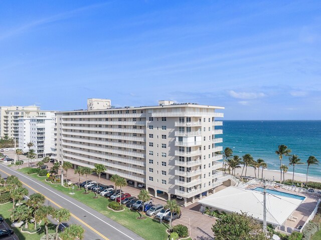 view of building exterior with a water view
