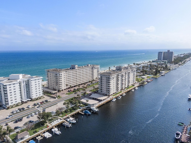 aerial view featuring a city view and a water view