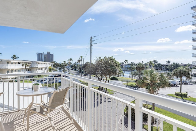 balcony featuring a water view