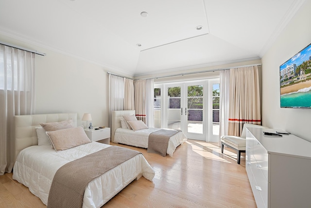 218 Seabreeze Ave, Palm Beach, FL 33480 - bedroom featuring french doors, crown molding, light wood-style flooring, access to exterior, and a raised ceiling