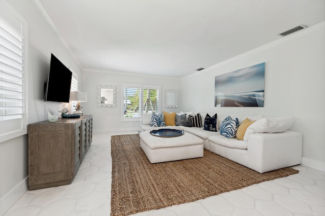 living room featuring crown molding