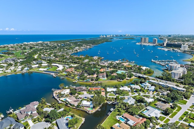 birds eye view of property featuring a water view