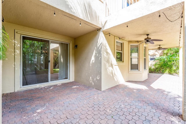 view of patio featuring ceiling fan