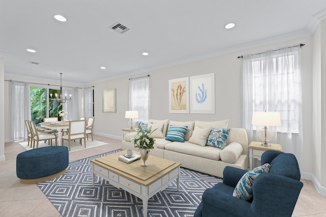 living room featuring crown molding, light tile patterned flooring, and a notable chandelier