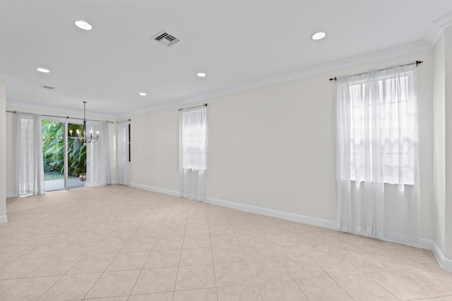 tiled empty room with crown molding and an inviting chandelier