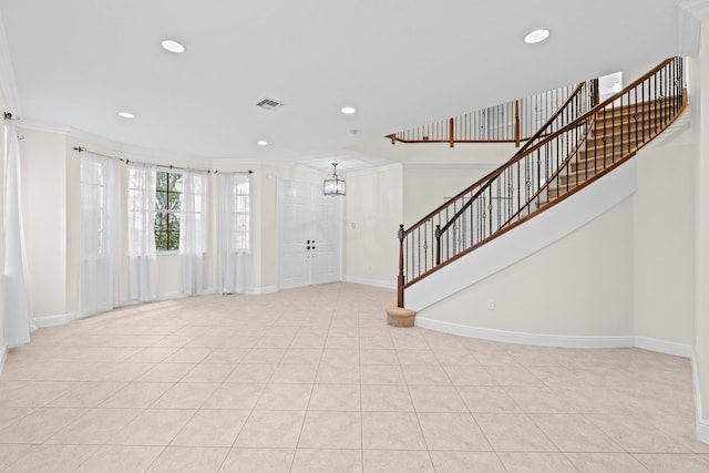 interior space featuring crown molding