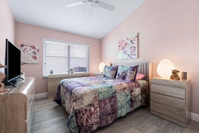 bedroom featuring vaulted ceiling and ceiling fan