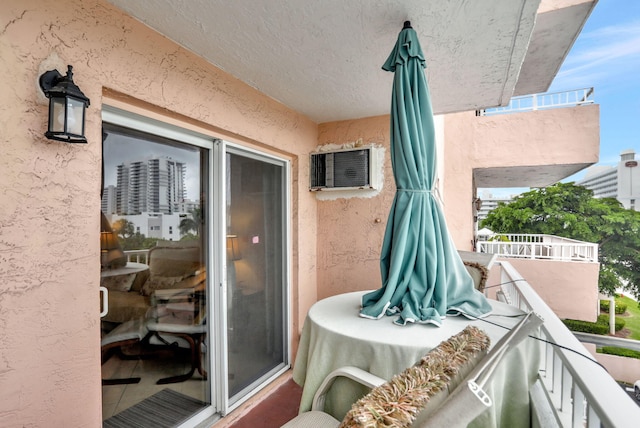 balcony with an AC wall unit