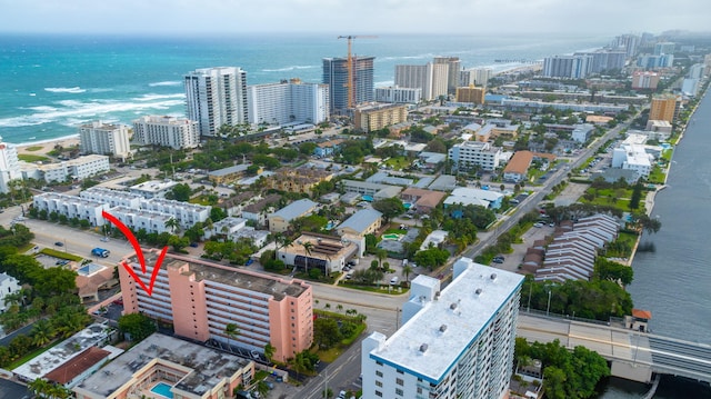 drone / aerial view featuring a water view