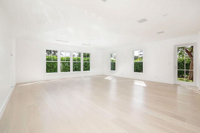 spare room featuring light hardwood / wood-style flooring