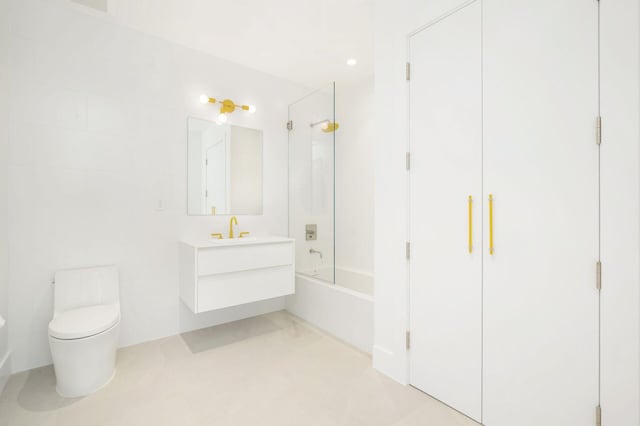 full bathroom featuring toilet, vanity, and shower / bathing tub combination