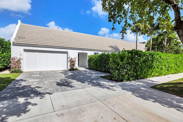 exterior space with a garage