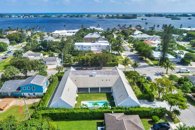 bird's eye view with a water view