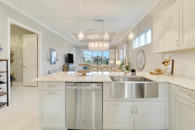 kitchen with dishwasher, kitchen peninsula, white cabinets, hanging light fixtures, and backsplash