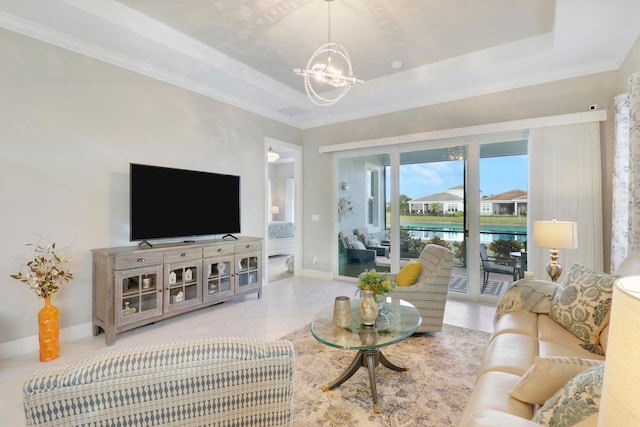 living room with crown molding, light tile patterned floors, an inviting chandelier, and a raised ceiling