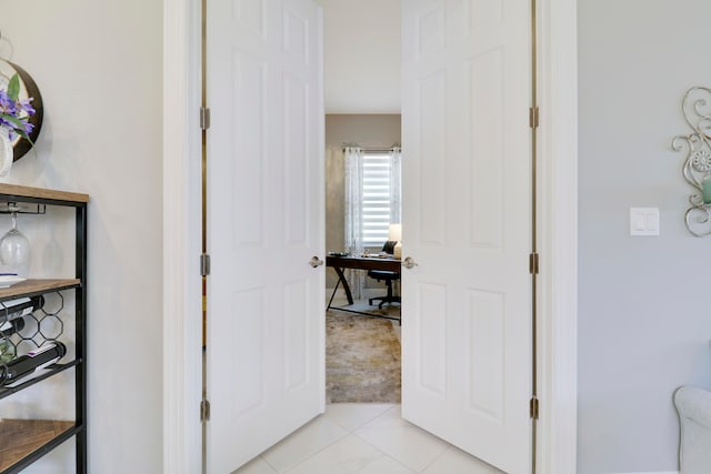 corridor with light carpet