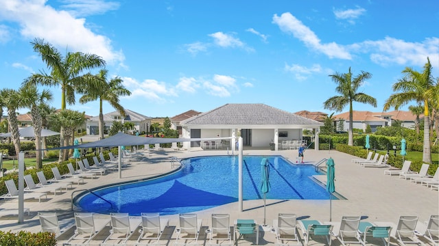 view of swimming pool featuring a patio area