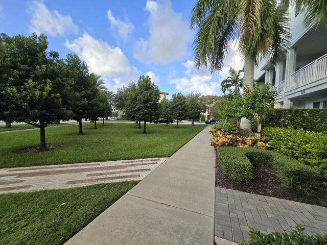 view of community featuring a lawn