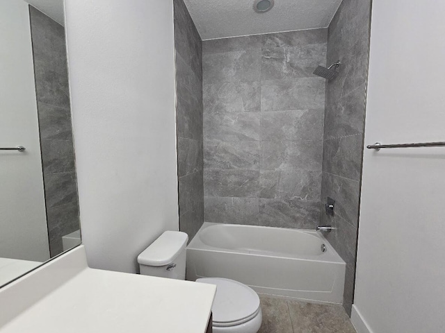 bathroom featuring toilet, shower / tub combination, tile patterned flooring, and vanity