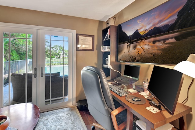 office area with french doors and hardwood / wood-style floors