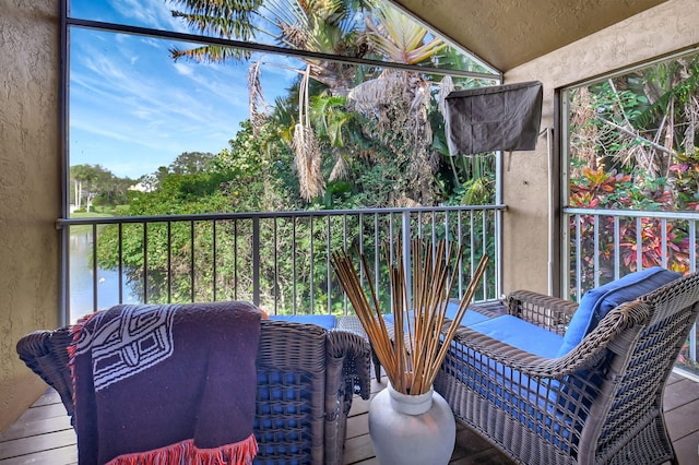 balcony featuring a water view