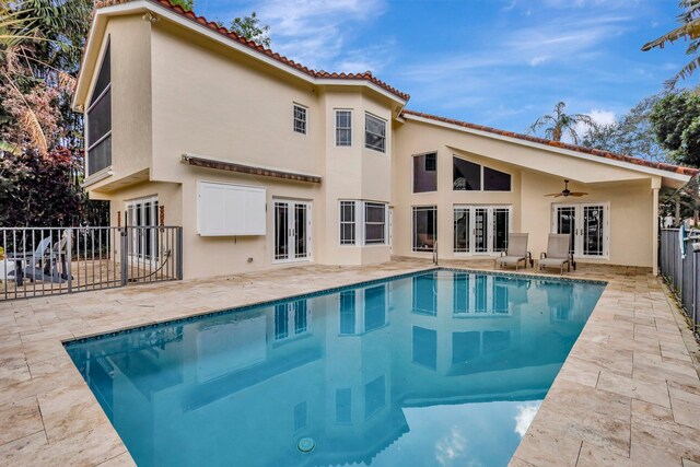 mediterranean / spanish-style home with a garage