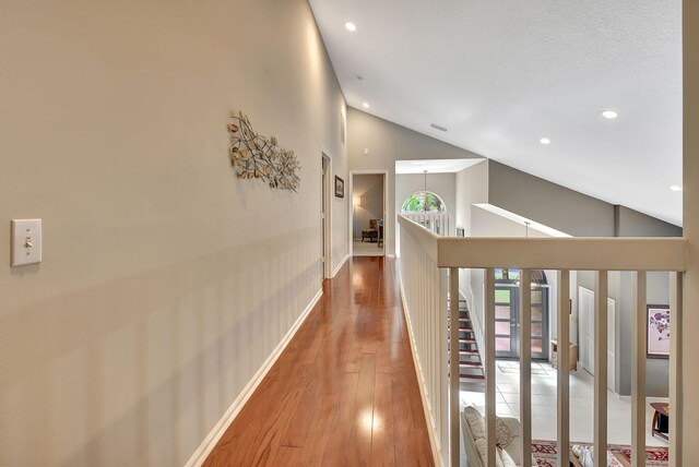 carpeted bedroom with ceiling fan and a textured ceiling